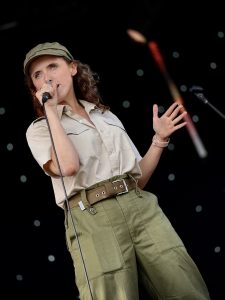 Chrystal Bliss in her wartime outfit singing popular tunes from the wartime era